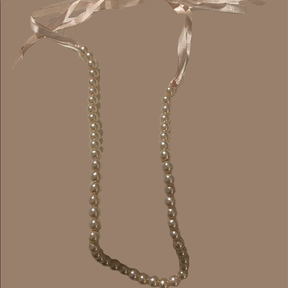 Long pearl necklace